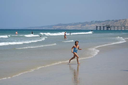 La Jolla Shores Beach is a sandy playground for kids and a haven for surfers, kayakers, scuba divers, photographers, joggers and walkers